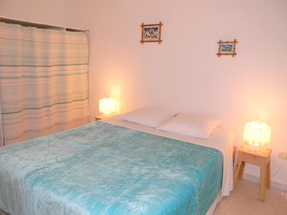 Chambre turquoise haut de villa
